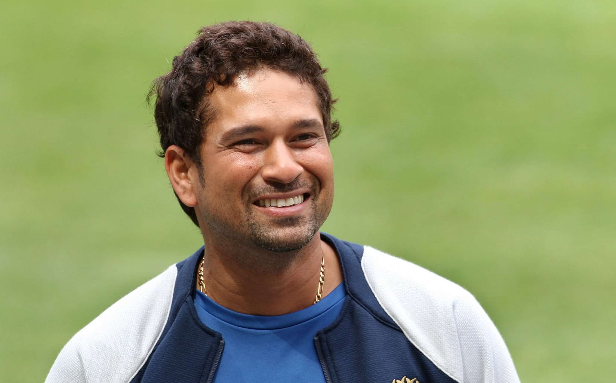 Indian players Sachin Tendulkar smiles after inspecting the wicket