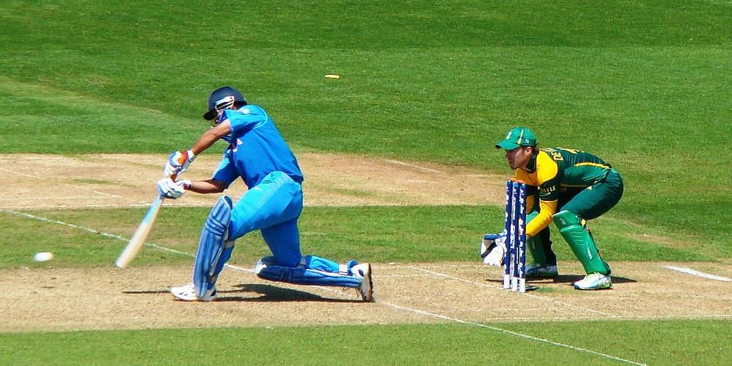 MS Dhoni hits a six down the ground