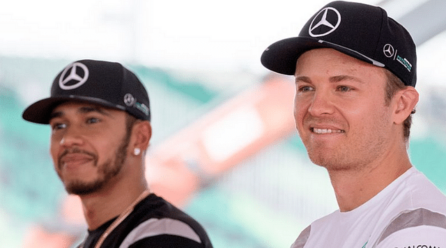 Vettel mimics the Rosberg-Hamilton hat incident