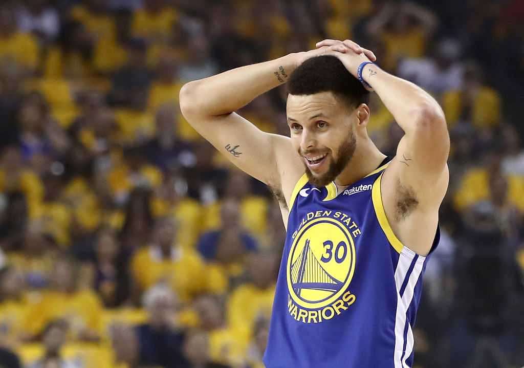 A special adviser offers good-luck tips to Warriors NBA Draft lottery rep Steph  Curry