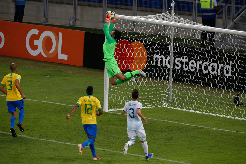Alisson Becker: Watch Brazil goalkeeper pulling off an incredible save to deny Lionel Messi from free-kick