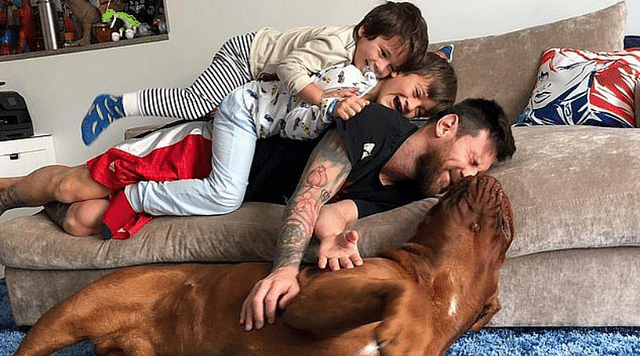 Lionel Messi: Watch Barcelona Superstar play piggy in the middle with his dog Hulk and children Thiago and Mateo