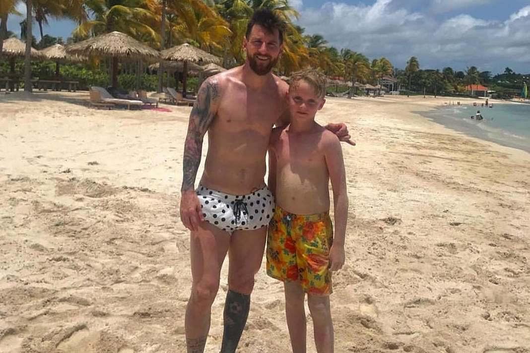 Watch: Lionel Messi plays football with an 11-year-old fan on a beach