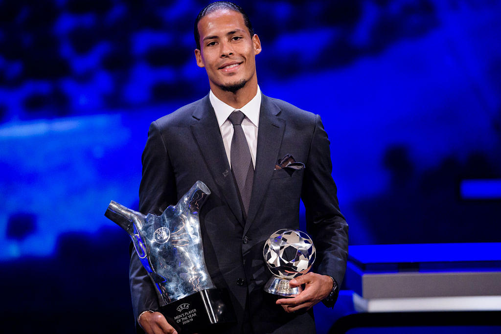 Watch: Virgil Van Dijk talks about Liverpool’s 4-0 victory against Barcelona while Lionel Messi sits awkwardly