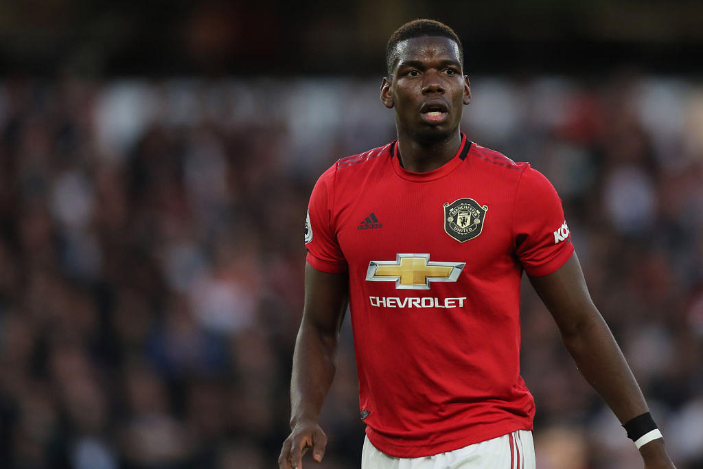 Paul Pogba ended staying at Manchester United after sportswear company intervenes in his transfer to Real Madrid