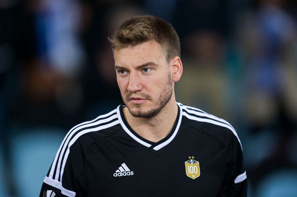 Nicklas Bendtner : Former Arsenal star's home kit sold out after