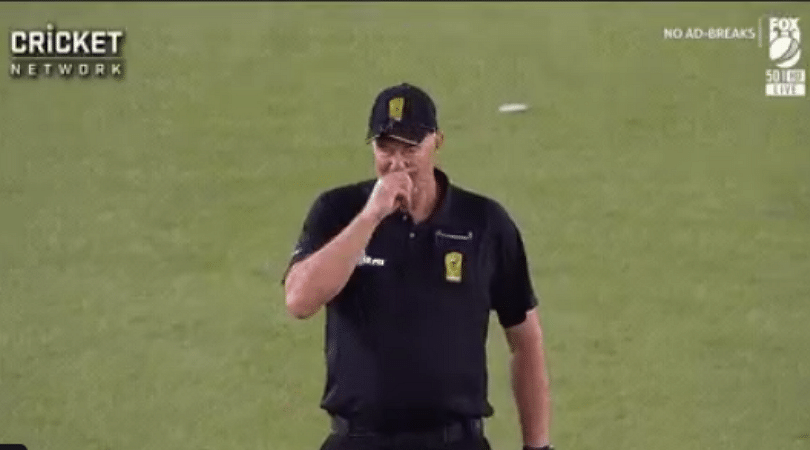 BBL 2019 umpire Greg Davidson fakes a nose itch off Rashid Khan’s bowling during Renegades vs Strikers