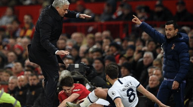 Daniel James nearly takes out Jose Mourinho on the sidelines after going down from a challenge