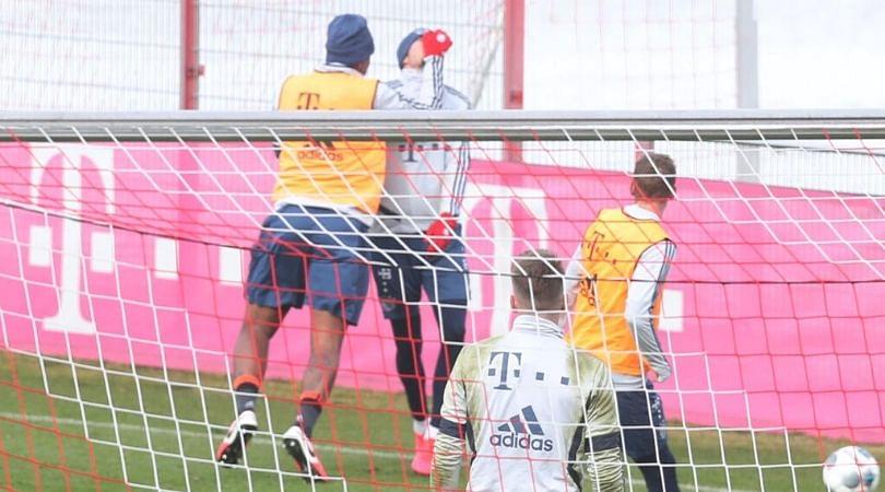Jerome Boateng punches Leon Goretzka during a brawl in Bayern Munich's training
