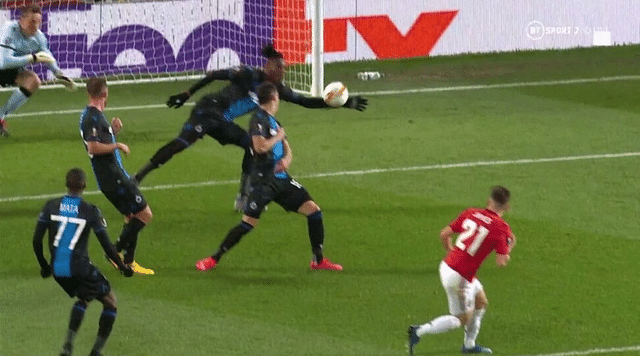 Simon Deli red card vs Man Utd Club Brugge defender sent off after hilarious handball and 5-minute long VAR check