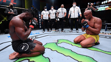 Uriah Hall cries in front of Anderson Silva after his TKO win at UFC Vegas 12