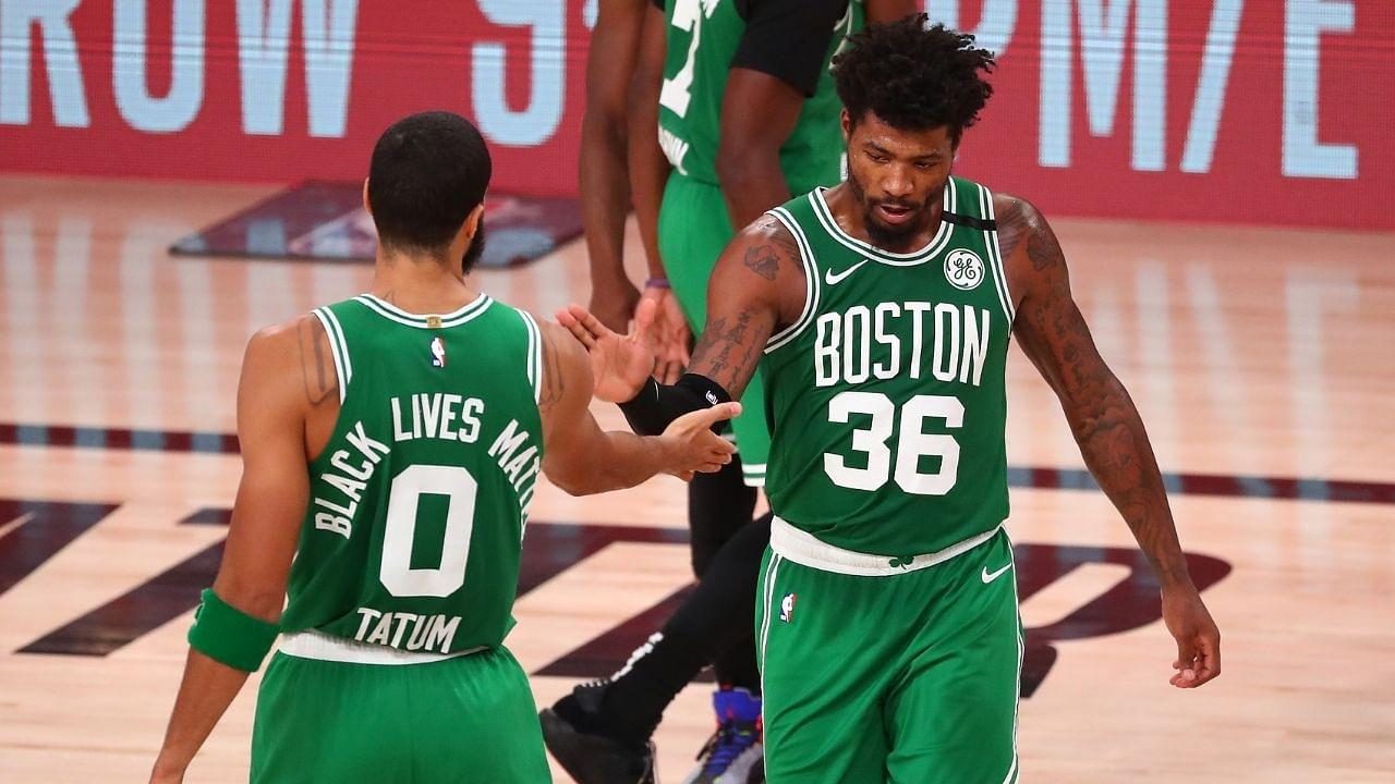 'Celtics locker room in turmoil': Marcus Smart gets his aged whiskey stolen and replaced by karaoke set during team's Secret Santa