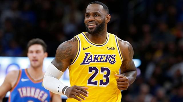 "LeBron James is just messing around": Lakers star hilariously tries tightrope walking on scorer's table during beatdown of Chicago Bulls
