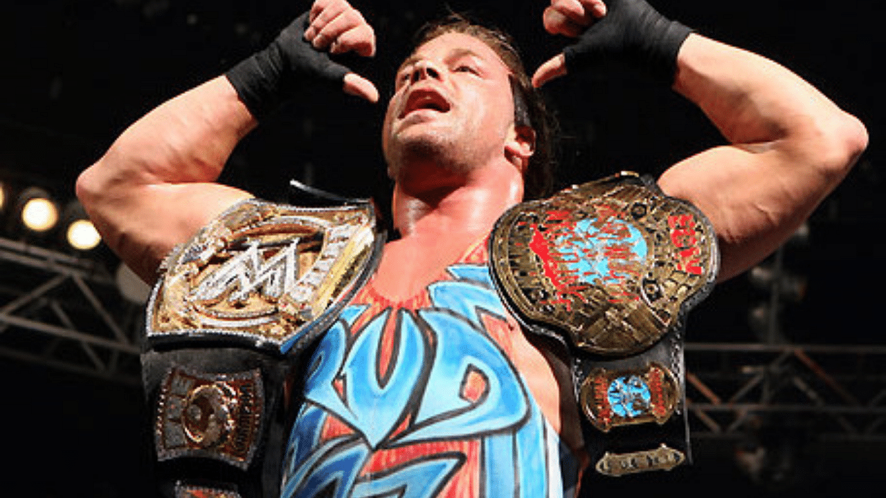 Rob Van Dam with both his WWE Championship and ECW Championship titles.