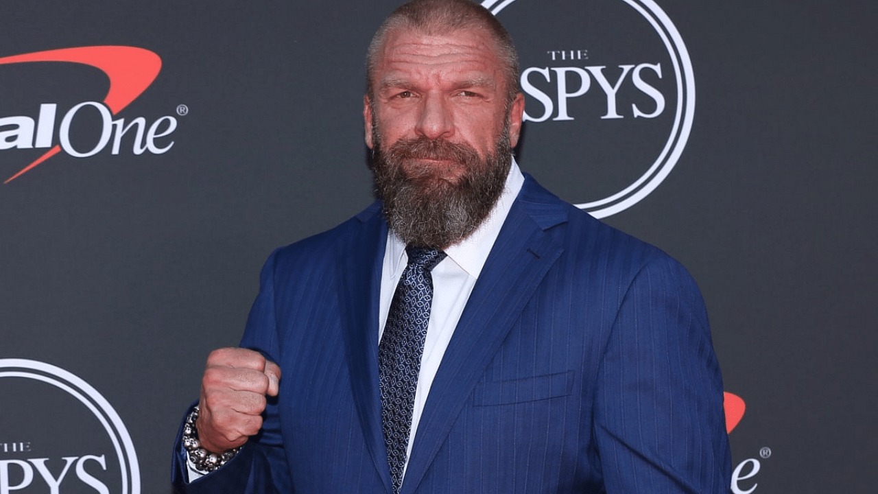 Triple H explains why WWE Superstars are not called wrestlers