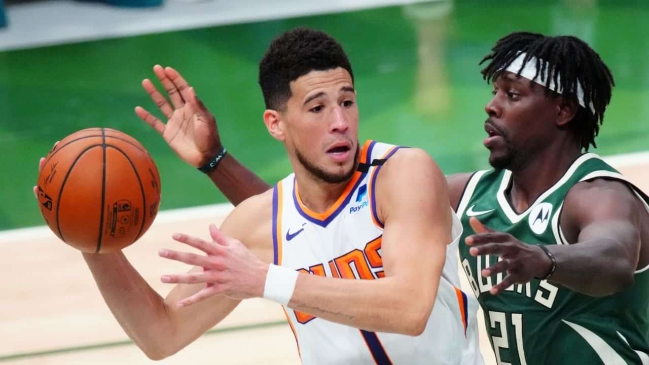 “Devin Booker literally wrapped his arms around Jrue Holiday” NBA fans
