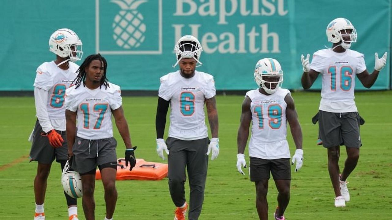 dolphins camp roster battles narrowly