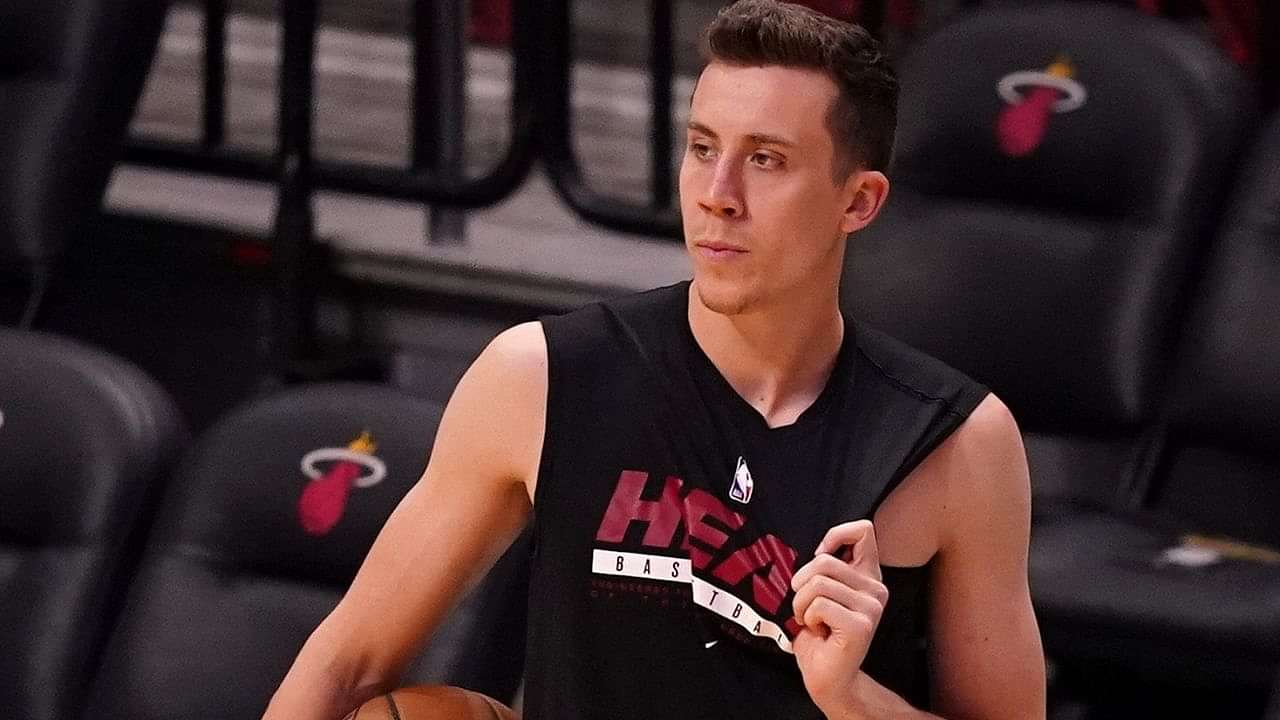 “Duncan Robinson sh*tted in the Playoffs last year”: NBA fans hilariously roast the Miami Heat sharpshooter’s $90 million contract while he hides behind a car to surprise them