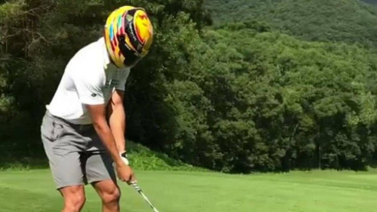 "That's crazy"– Steph Curry plays golf shot while wearing Lewis Hamilton helmet