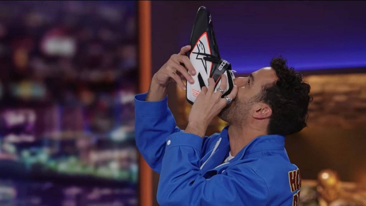 "The taste of victory and agony of da feet!"- Watch Daniel Ricciardo do a shoey at The Daily Show with Trevor Noah