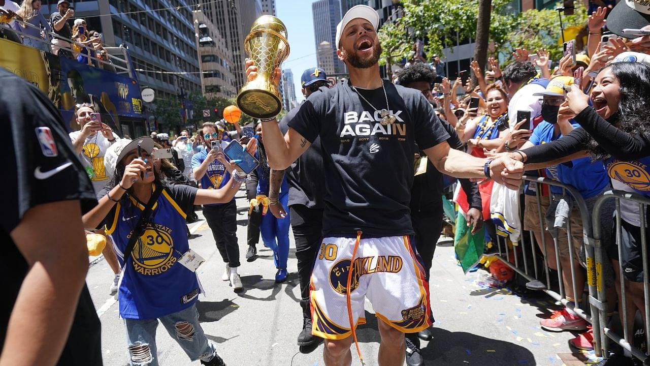 “That’s the kind of step back Ayesha Curry is teaching Stephen Curry!”: NBA Twitter reacts as a random lady attempts to kiss the FMVP during the GSW championship parade