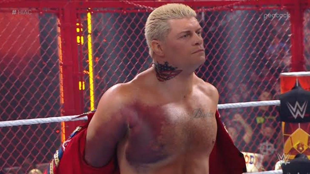 Cody Rhodes wrestling with a torn pectoral muscle at Hell in a Cell