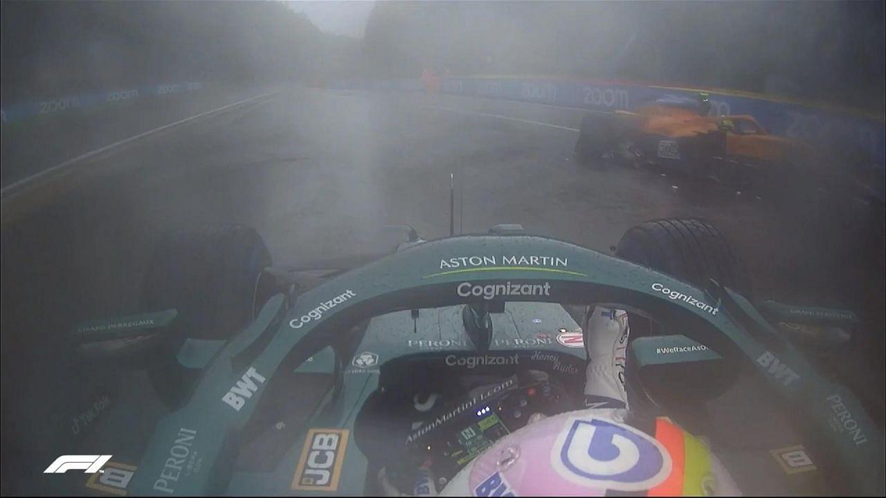 Sebastian Vettel checks on Lando Norris after his $100,000 McLaren crash at the 2021 Belgian Grand Prix