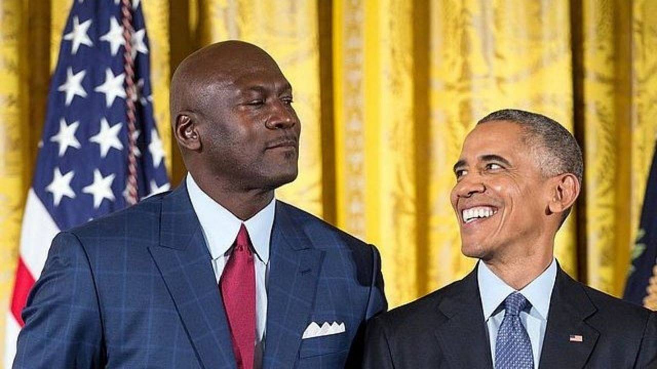 Michael Jordan looks down on Barack Obama as he receives the Presidential Medal of Freedom