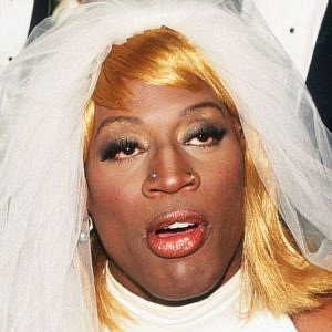 Dennis Rodman was covered in gold dust and a glittering golden suit in ...