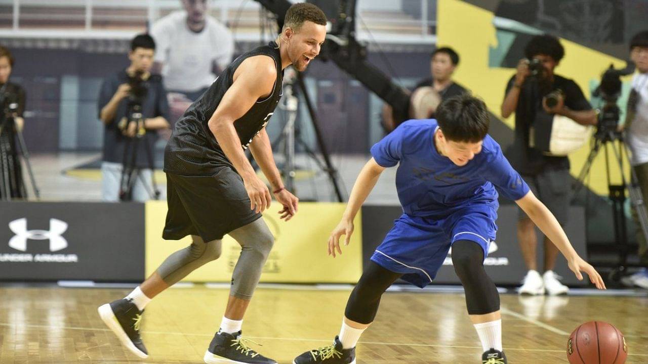 Stephen Curry tosses a Korean fan's LeBron James shoes to the sidelines before gifting him the SC30s and autographing them.