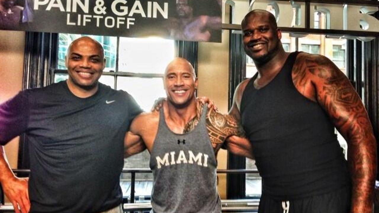 Charles Barkley fakes a 405lb bench press to beat Shaquille O'Neal in front of The Rock