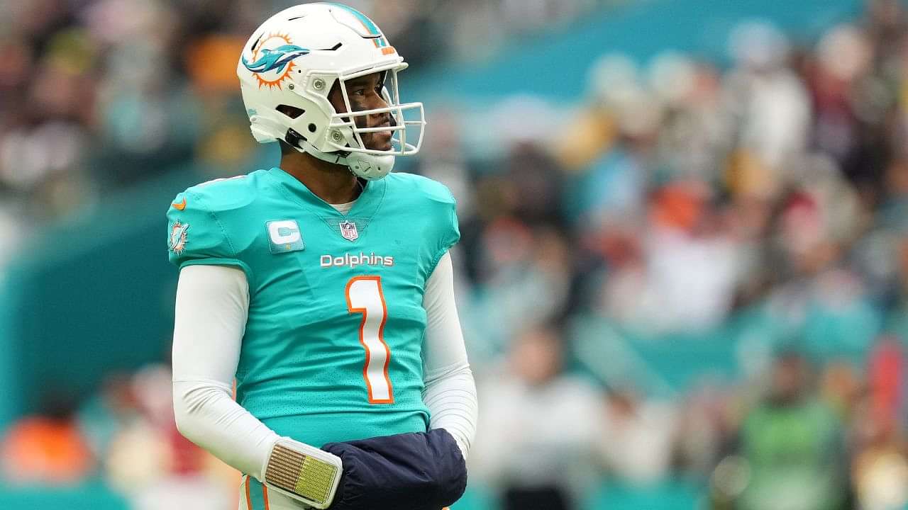 A Miami Dolphins helmet rests on the field during an NFL football