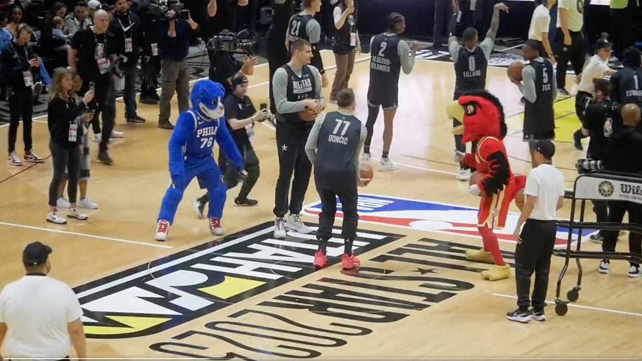 WATCH: Luka Doncic Hits Ridiculous Behind-the-back Half-court Shot Copying the Sixers Mascot During All-Star Warmups 