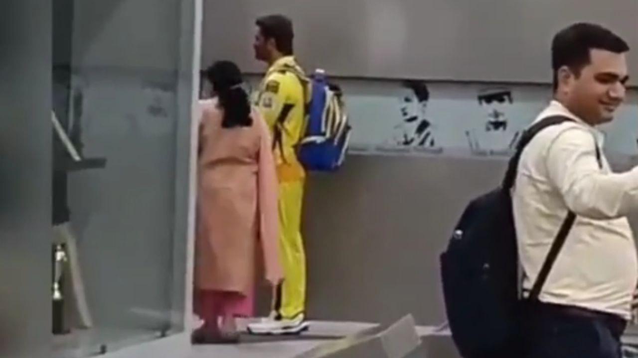 WATCH: MS Dhoni's fan takes footwear off while getting clicked with him; video goes viral