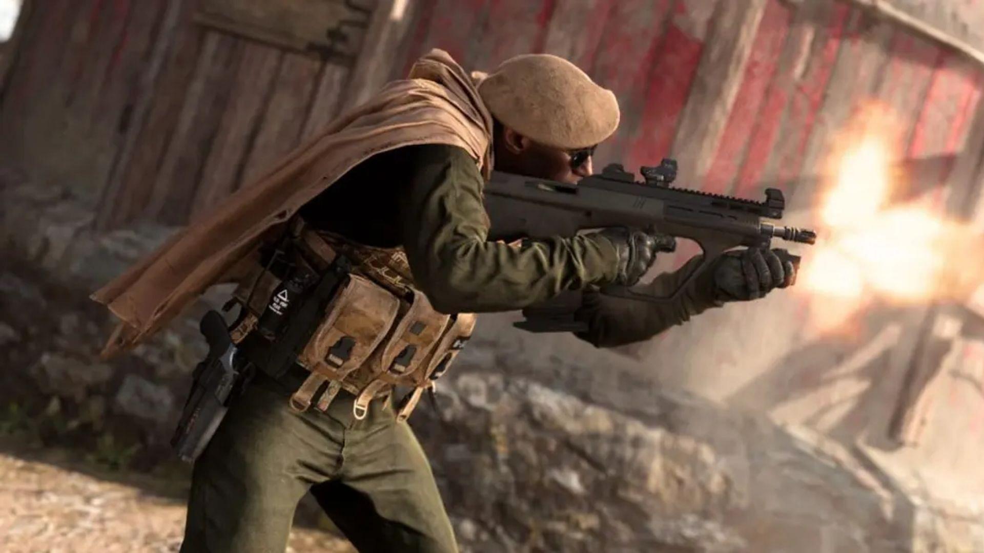 An operator firing MX9 in Warzone 2.0