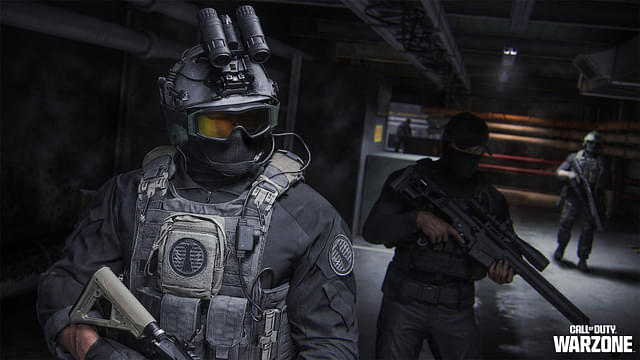 An Image of multiple soldiers standing with weapons in their hands