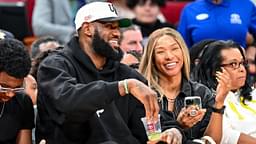 Mar 28, 2023; Houston, TX, USA; Los Angeles Laker LeBron James and his wife Savannah James sit court side at the McDonald's All American game during the first half at Toyota Center. Mandatory Credit: Maria Lysaker-USA TODAY Sports
