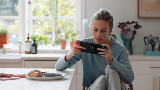 Brie Larson playing on a Nintendo Switch