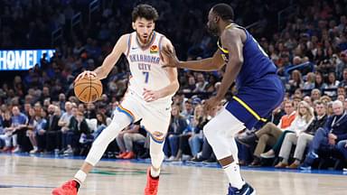 Dec 8, 2023; Oklahoma City, Oklahoma, USA; Oklahoma City Thunder forward Chet Holmgren (7) moves to the basket against Golden State Warriors forward Draymond Green (23) during the second quarter at Paycom Center. Mandatory Credit: Alonzo Adams-USA TODAY Sports