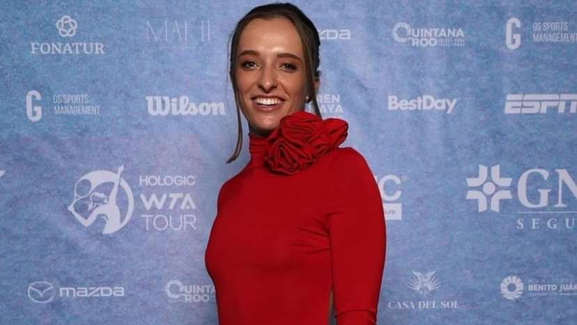 Iga Swiatek Puts WTA Finals Iconic Red Dress And Autograph Up for