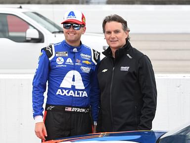 DARLINGTON, SC - MAY 08: NASCAR, Motorsport, USA Hall of Fame Driver and Hendrick Motorsports Executive Jeff Gordon and William Byron 24 Hendrick Motorsports Liberty University Chevrolet look on during the running of the NASCAR Cup Series Goodyear 400 on May 08, 2022, at Darlington Raceway in Darlington, SC.Photo by Jeffrey Vest/Icon Sportswire AUTO: MAY 08 NASCAR Cup Series Goodyear 400 Icon220508032