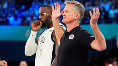United States head coach Steve Kerr reacts alongside guard LeBron James (6) during the first half against Serbia in a men's basketball semifinal game during the Paris 2024 Olympic Summer Games at Accor Arena.