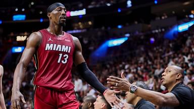 Bam Adebayo daps up Caron Butler