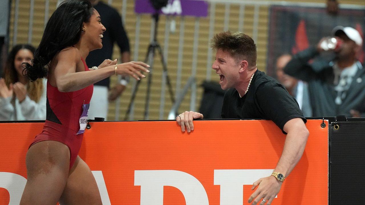 Tara Davis-Woodhall Makes Cheeky Simone Biles Reference While Watching Husband’s Paralympic Qualification