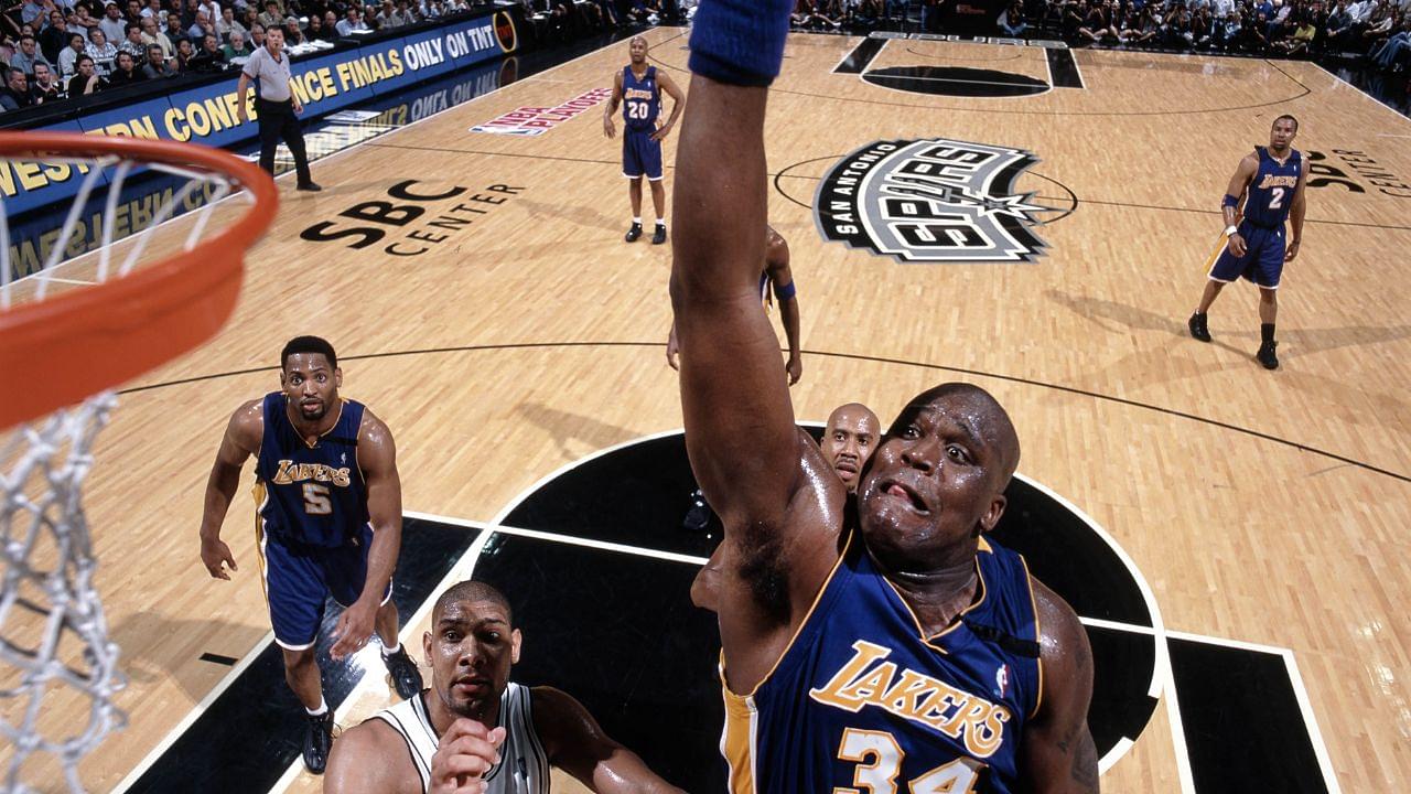 Shaquille O'Neal dunking during a game against the Spurs