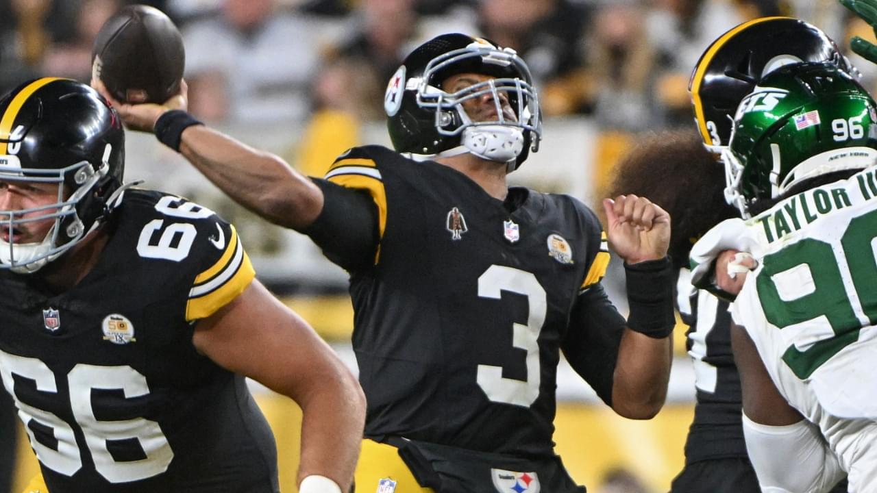 Oct 20, 2024; Pittsburgh, Pennsylvania, USA; Pittsburgh Steelers quarterback Russell Wilson (3) throws pass while being pressured by New York Jets defensive tackle Leonard Taylor III (96) during the second quarter at Acrisure Stadium.