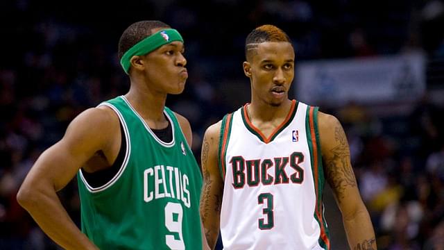 Boston Celtics guard Rajon Rondo (9) stands with Milwaukee Bucks guard Brandon Jennings (3) during the game at the Bradley Center