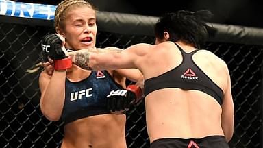 Paige VanZant (red gloves) fights Jessica-Rose Clark (blue gloves) during UFC Fight Night at Scottrade Center.