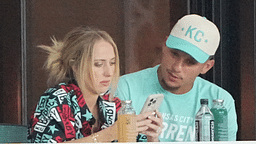 Kansas City Chiefs quarterback Patrick Mahomes and wife Brittany watch play during the first half against the Washington Spirit at CPKC Stadium.