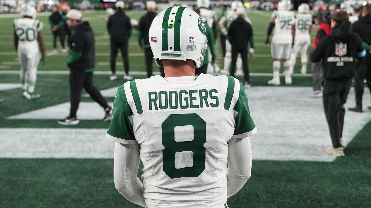 New York Jets quarterback Aaron Rodgers (8) warms up before the game against the Buffalo Bills at MetLife Stadium.